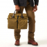 Filson 24-Hour Tin Cloth Briefcase Tan carried in hand 