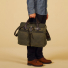 Filson-24-Hour-Tin-Cloth-Briefcase-Otter-Green-carrying-in-hand