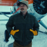Filson Down Bomber Jacket Otter Green lifestyle with plane