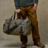 Filson Rugged Twill Duffle Bag Medium Otter Green carrying in hand
