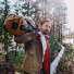 Filson Rugged Twill Duffle Bag Medium Tan wearing over shoulder