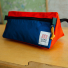 Topo Designs Dopp Kit Blue/Red on the road