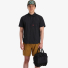 Topo Designs Mountain Cross Bag Black wearing in hand