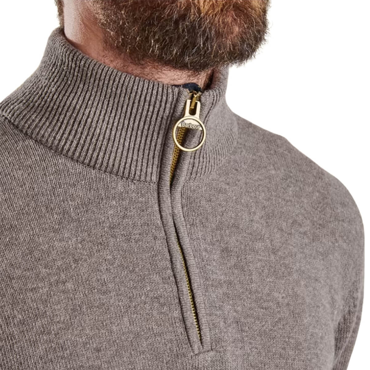 Barbour Holden Half Zip Lamswool Sweater is a stylish and versatile men's jumper made from luxurious lambswool. 