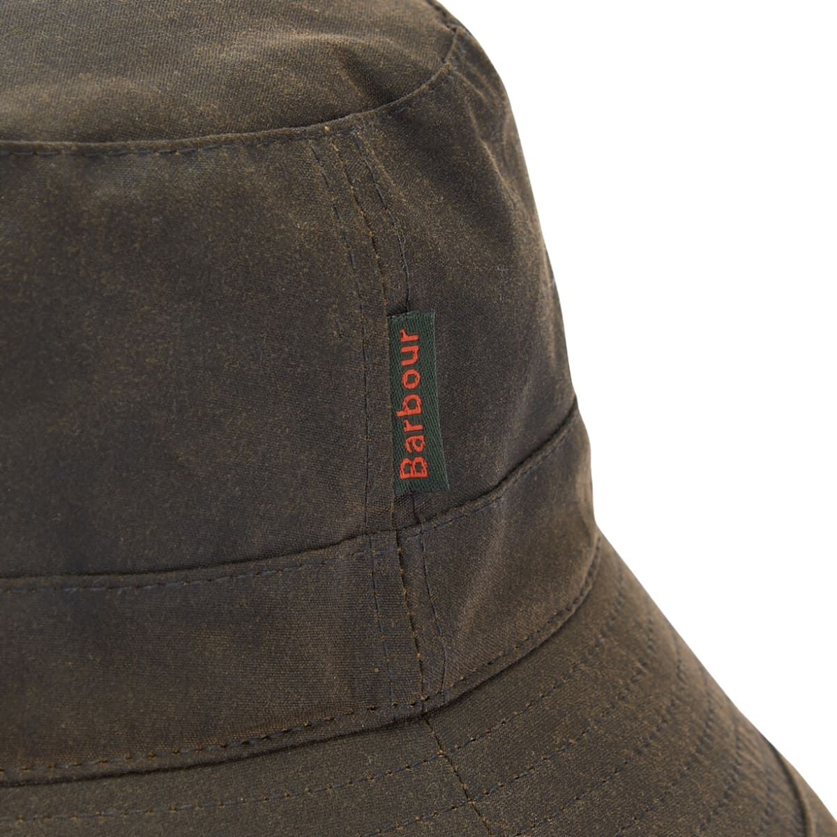 Barbour Wax Bucket Hat Olive, made from durable waxed cotton with a cozy tartan lining