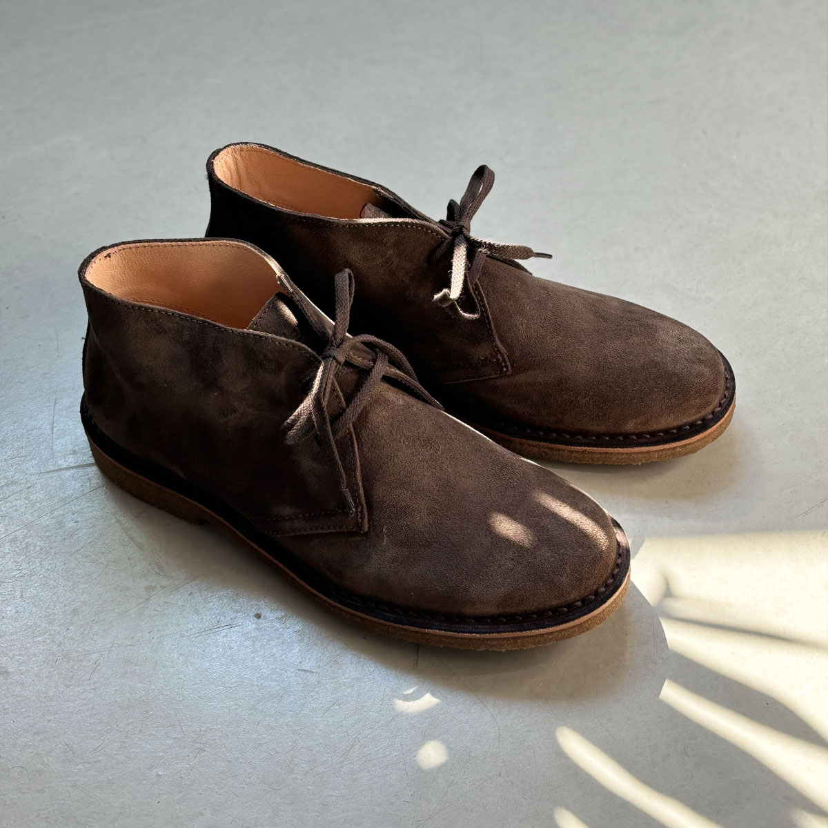 Astorflex Greenflex Boot Dark Chestnut, on a concrete floor