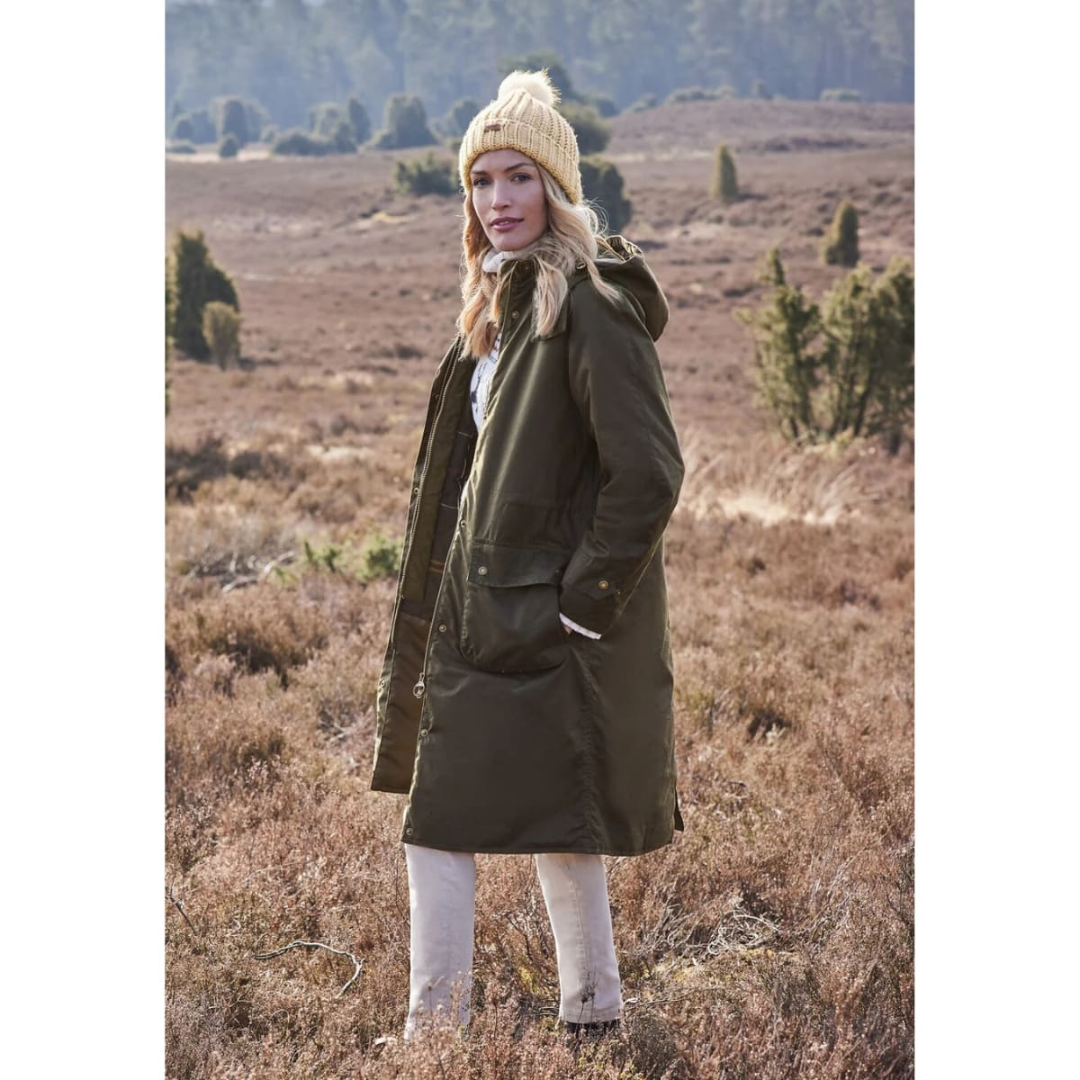 Barbour Long Cannich Wax Jacket in Olive for women is a longline parka crafted from waxed cotton