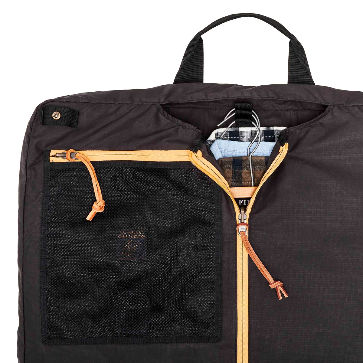 Filson Traveller Suit Cover Stapleton Cinder, webbing handles on the top and bottom allow folded hand carry