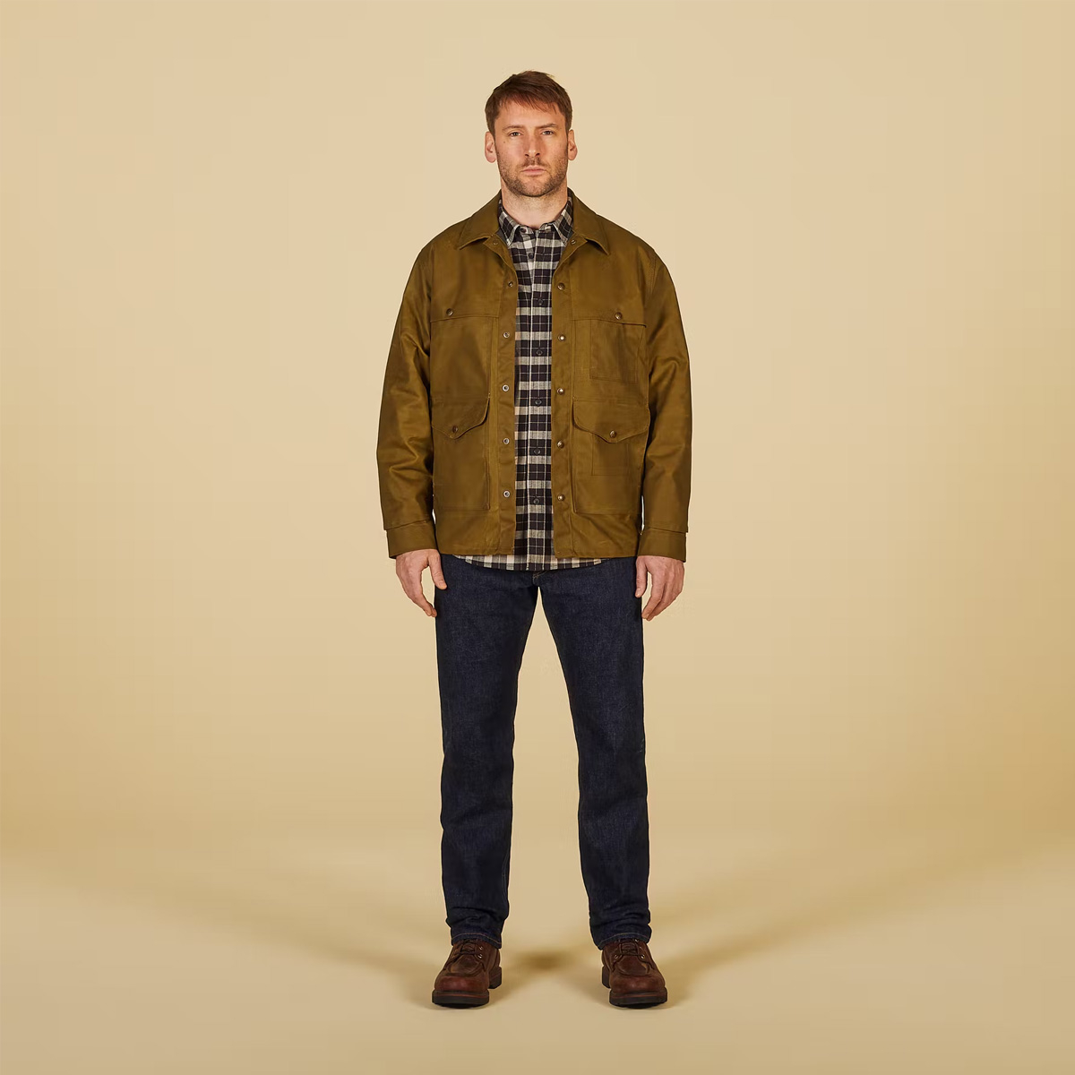 Filson Lined Tin Cloth Cruiser Jacket Dark Tan, a classic Cruiser that has provided tough-as-nails protection in the field