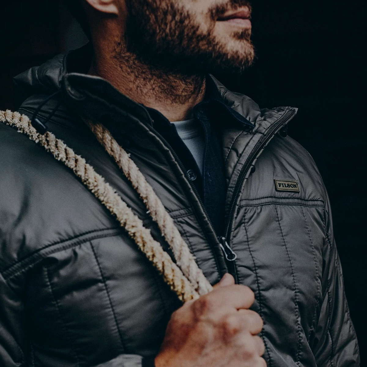 Filson Ultralight Hooded Jacket Black, perfect as an outer layer or underneath a heavy jacket for warmth in extreme cold