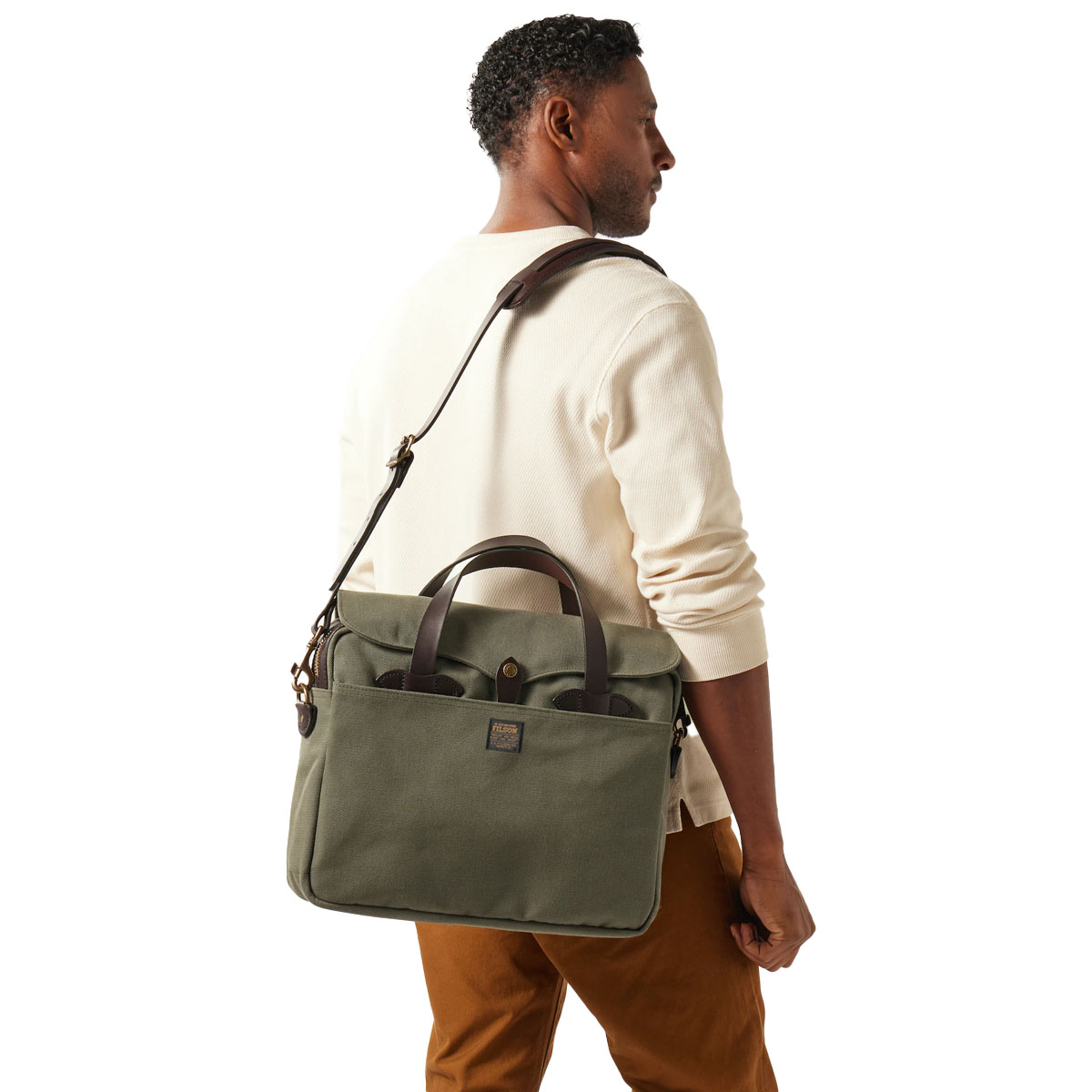 Filson Rugged Twill Original Briefcase Otter Green, carried on the shoulder