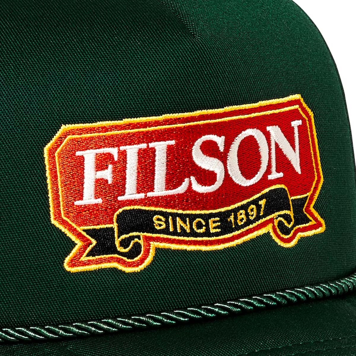 Filson Harvester Cap Spruce/Ribbon, a classic five-panel design made with sturdy polyester/cotton blend for years of service