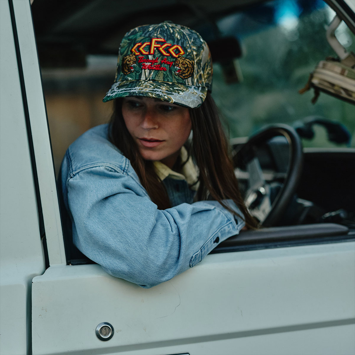 Filson Logger Cap Green Camo/Any Weather, classic Camo Logger Cap features a precurved brim to protect from rain and glare