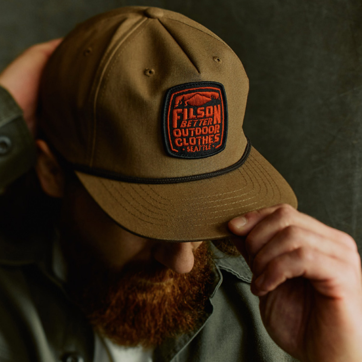 Filson Trucker Cap Light Brown/Filson, classic Trucker Cap features a precurved brim to protect from rain and glare