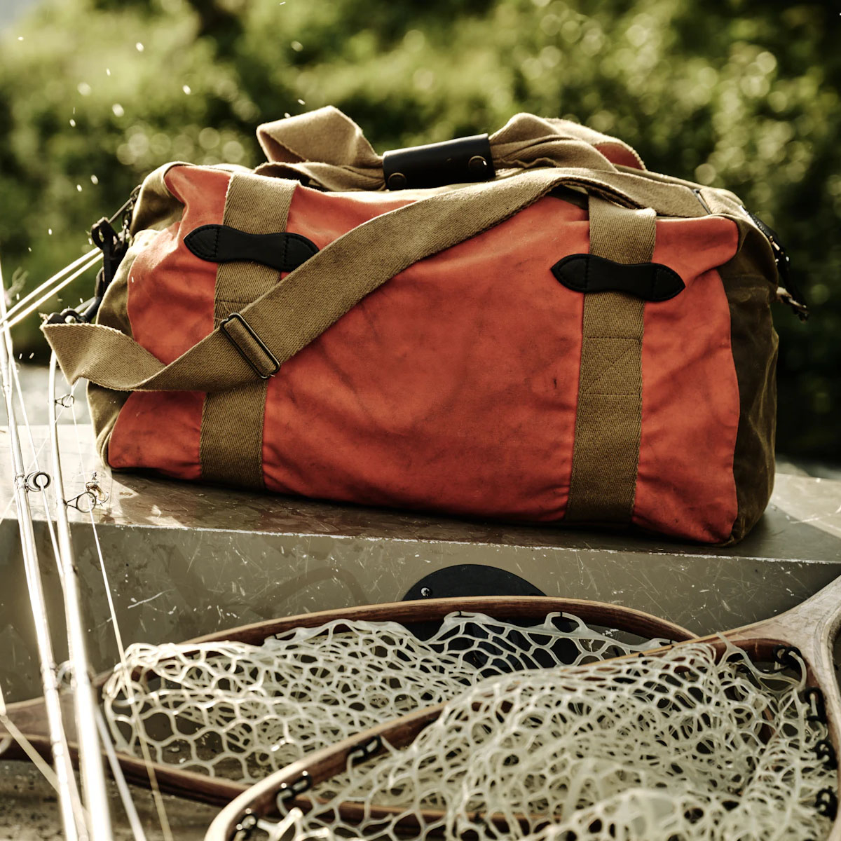 Filson Tin Cloth Medium Duffle Bag Dark Tan/Flame, a compact waxed-cotton duffle sized for overnight trips