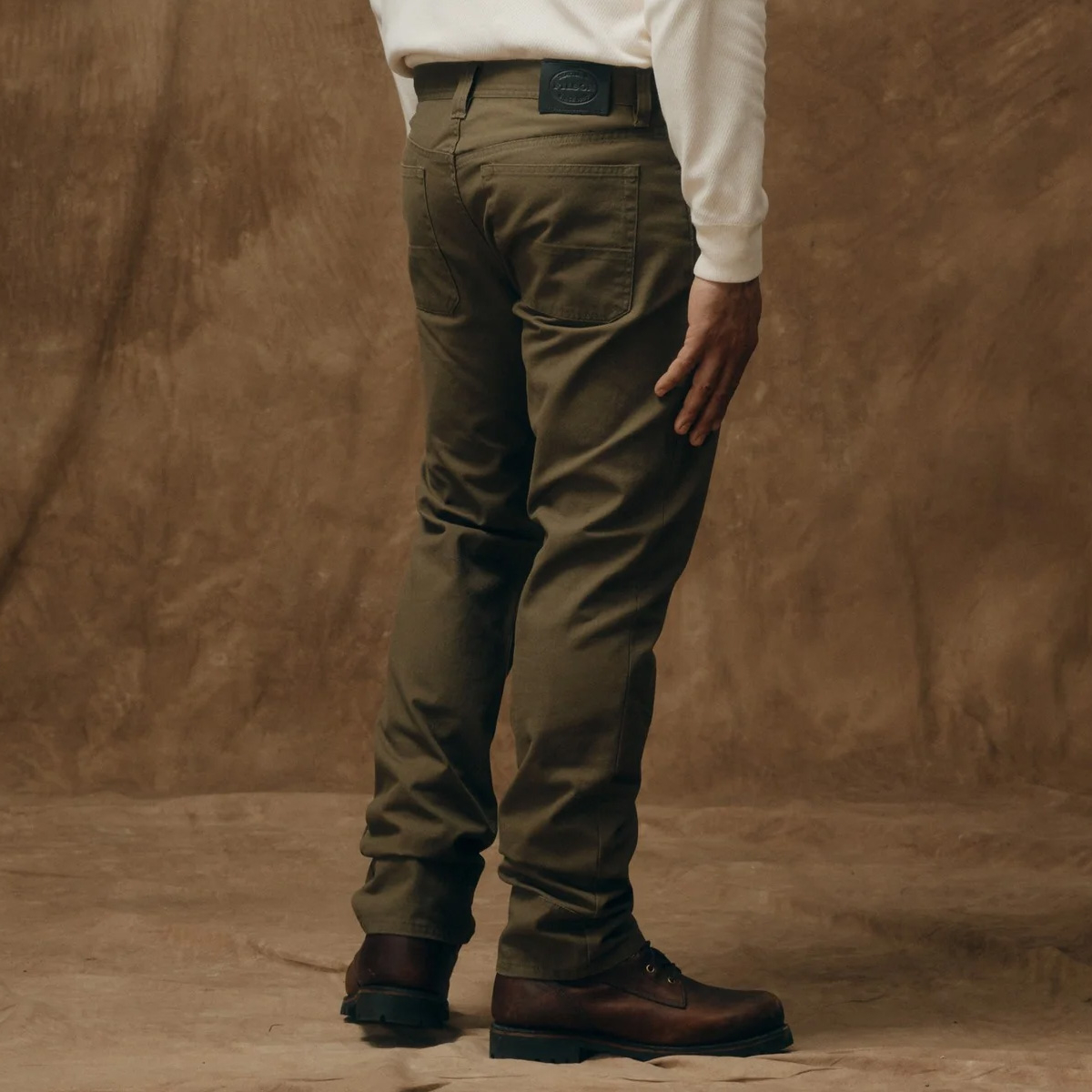 Filson Dry Tin 5 Pocket Pants Marsh Olive, Relaxed fit through the seat and thighs with straight legs. Cut slightly larger than other Filson pants to ensure ease of movement Filson Dry Tin 5 Pocket Pants Marsh Olive, Relaxed fit through the seat and thighs with straight legs. Cut slightly larger than other Filson pants to ensure ease of movement