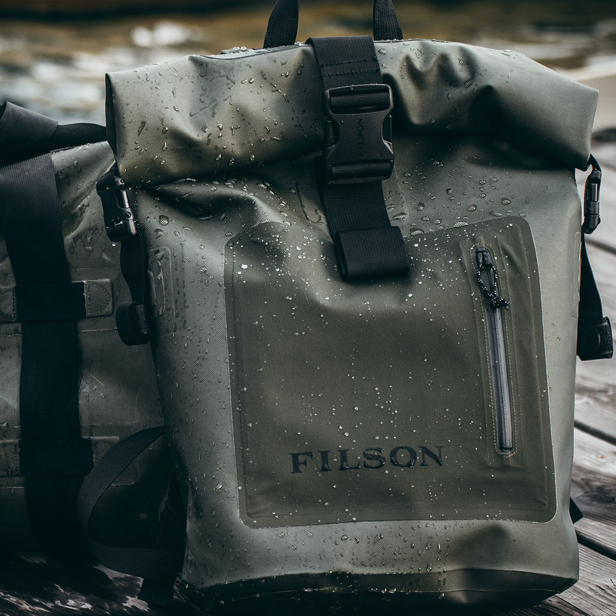 Filson Dry Backpack Laser Green keeps your gear dry in any weather