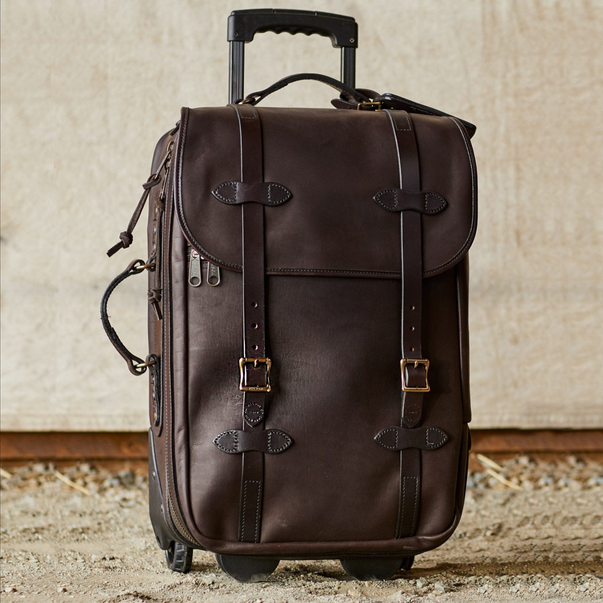 leather carry on luggage with wheels