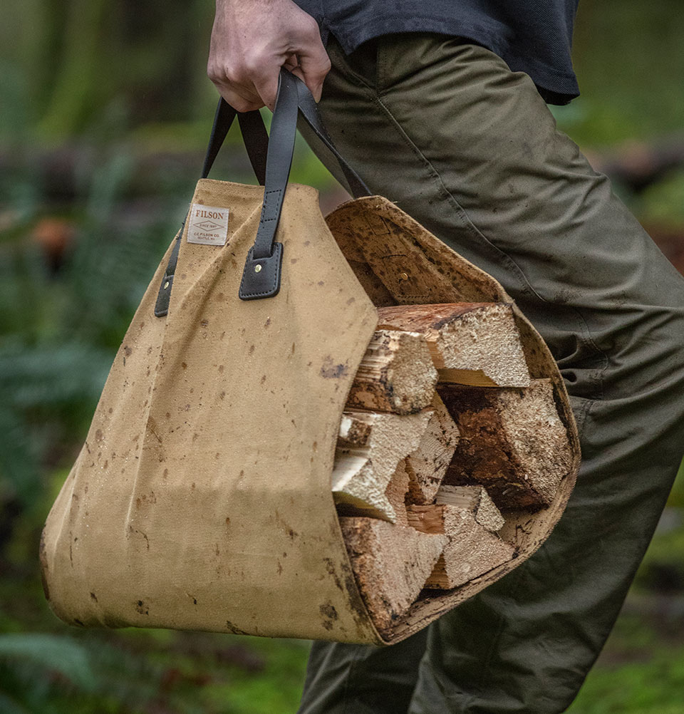 Filson Log Carrier Tan, if you can lift it, this Log Carrier will hold it
