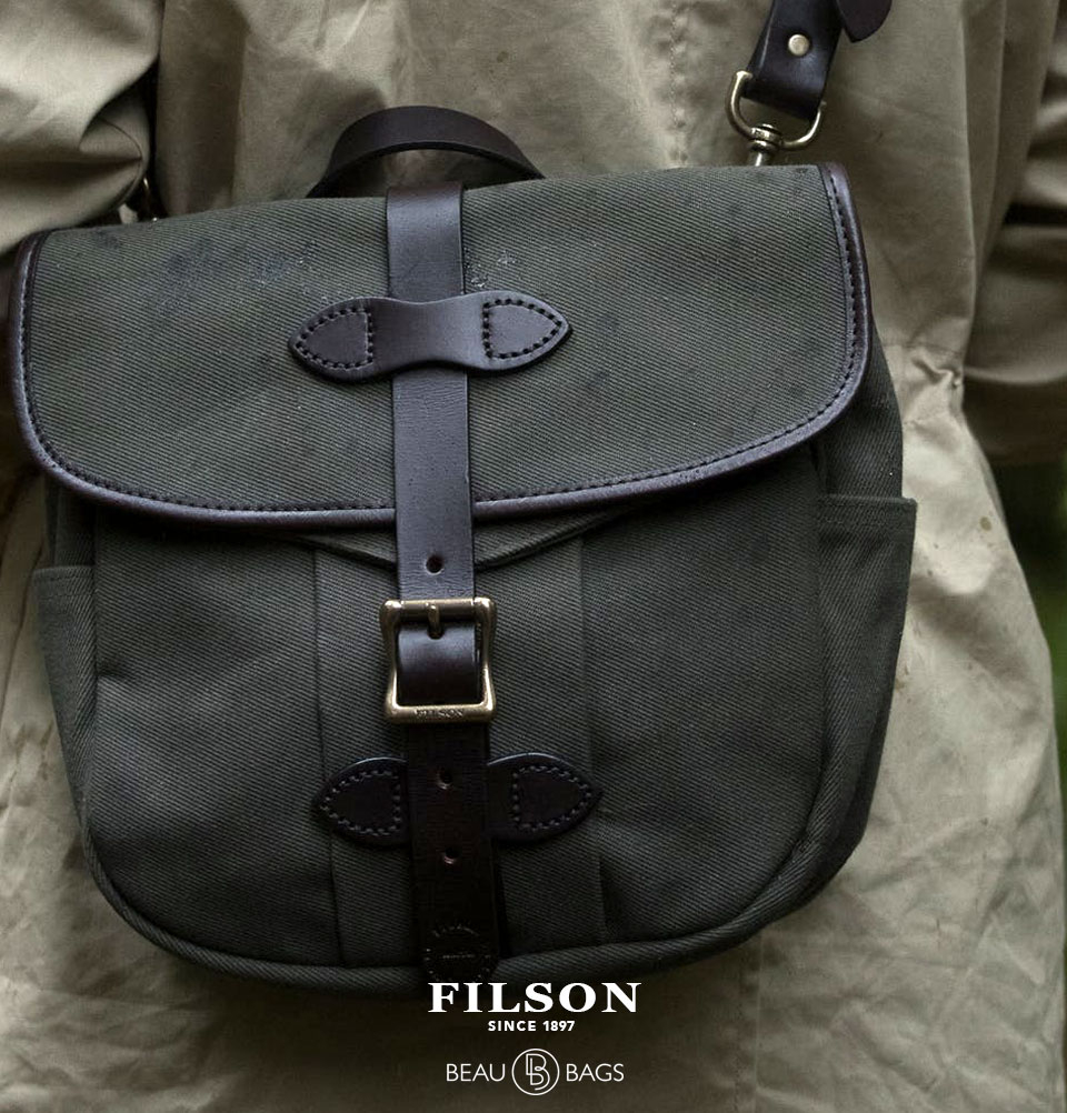 Filson Field Bag Small Otter Green, a rain-resistant field bag with reinforced base and an adjustable, removable shoulder strap