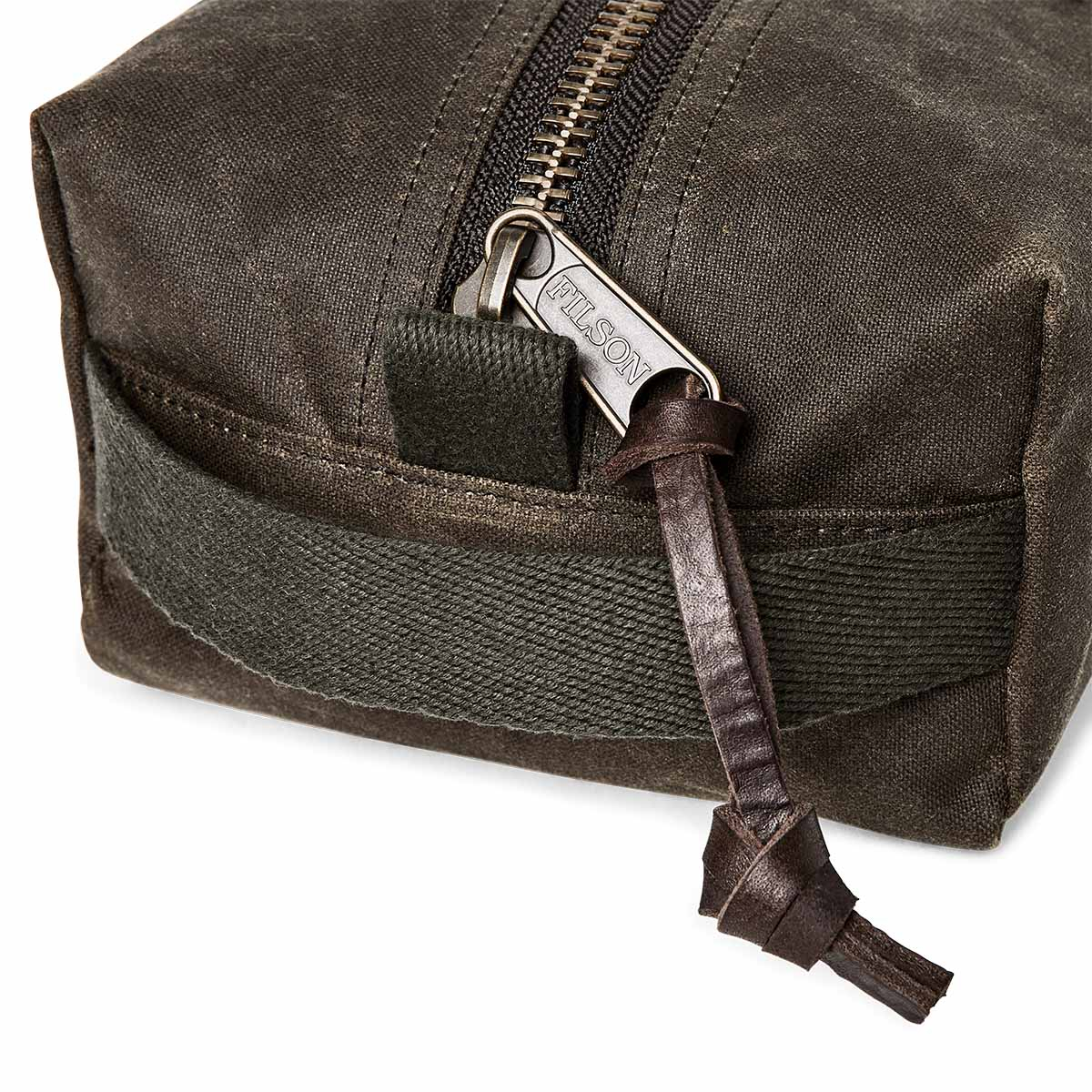 Filson Tin Cloth Travel Kit Otter Green, a compact, light, and tough dopp kit made with heritage materials and modern design