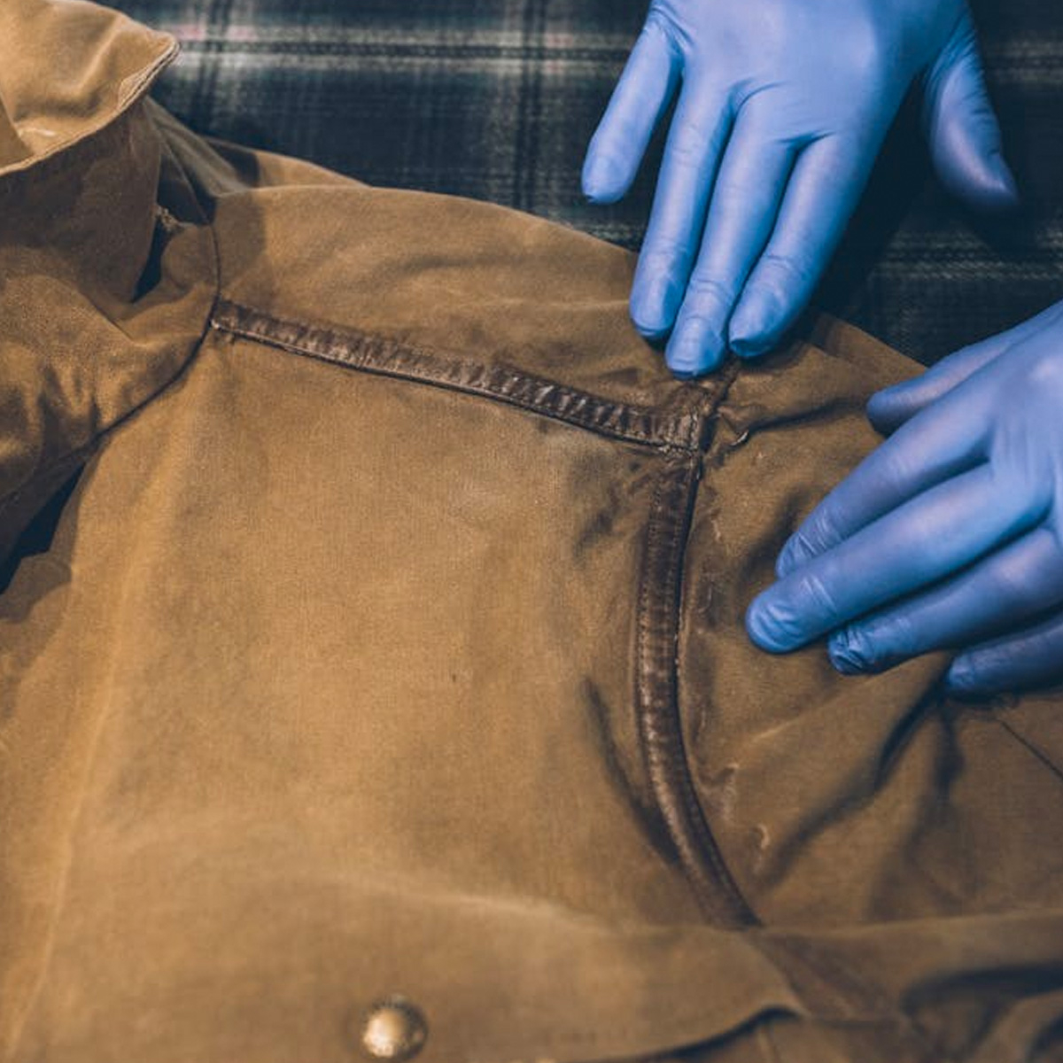 HOW TO REWAX A WAXED CANVAS JACKET, 5. HEAVY-USE AREAS, ESPECIALLY AT THE SEAMS, CAN BENEFIT FROM OCCASIONAL TOUCH-UPS
