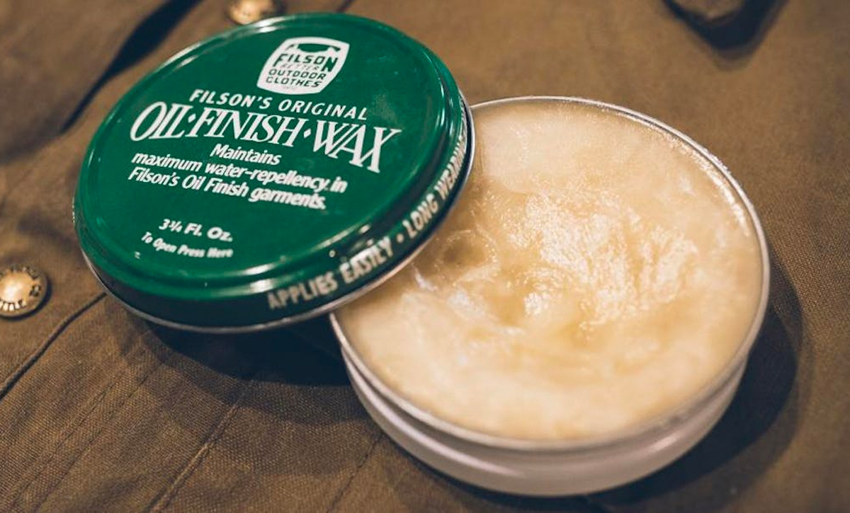 Filson Oil Finish Wax, maintains maximum water repellency in oil finish garments
