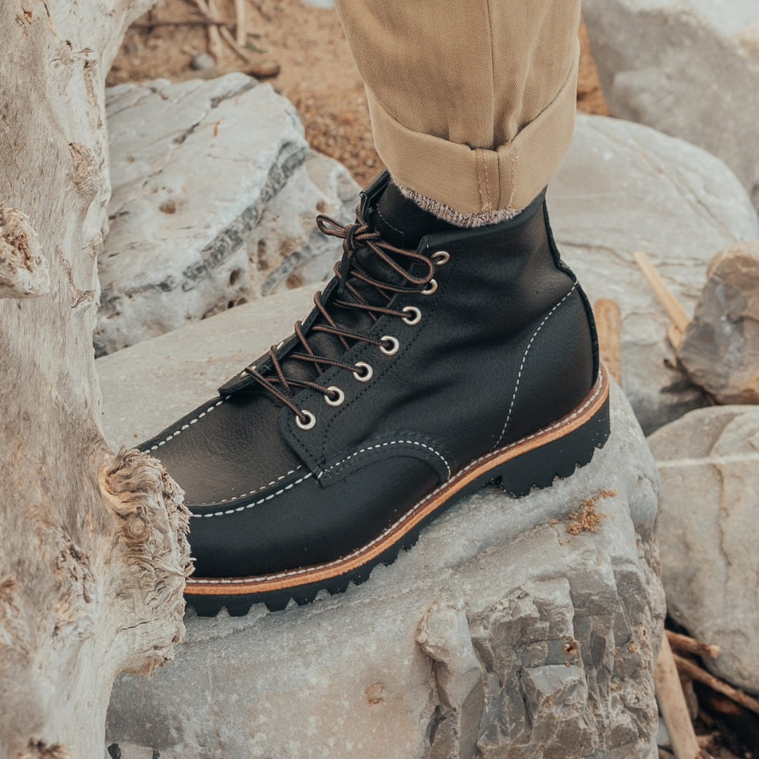 Red Wing 2949 Roughneck Moc Toe Boot Black Oil Slick leather is the perfect blend of craftsmanship, durability, and timeless design