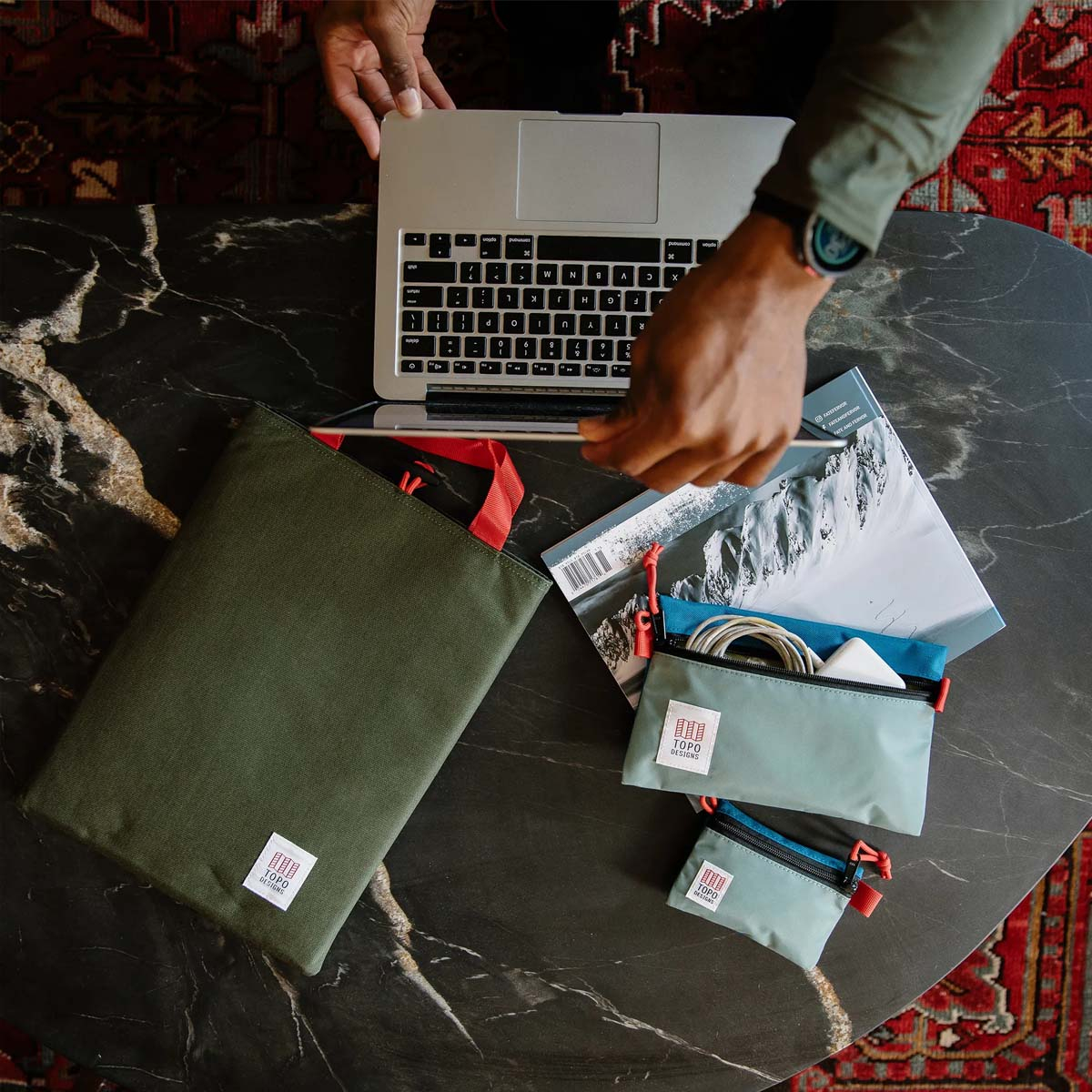 Topo Designs Laptop Sleeve Olive, made with 1000D nylon outer and foam padded body