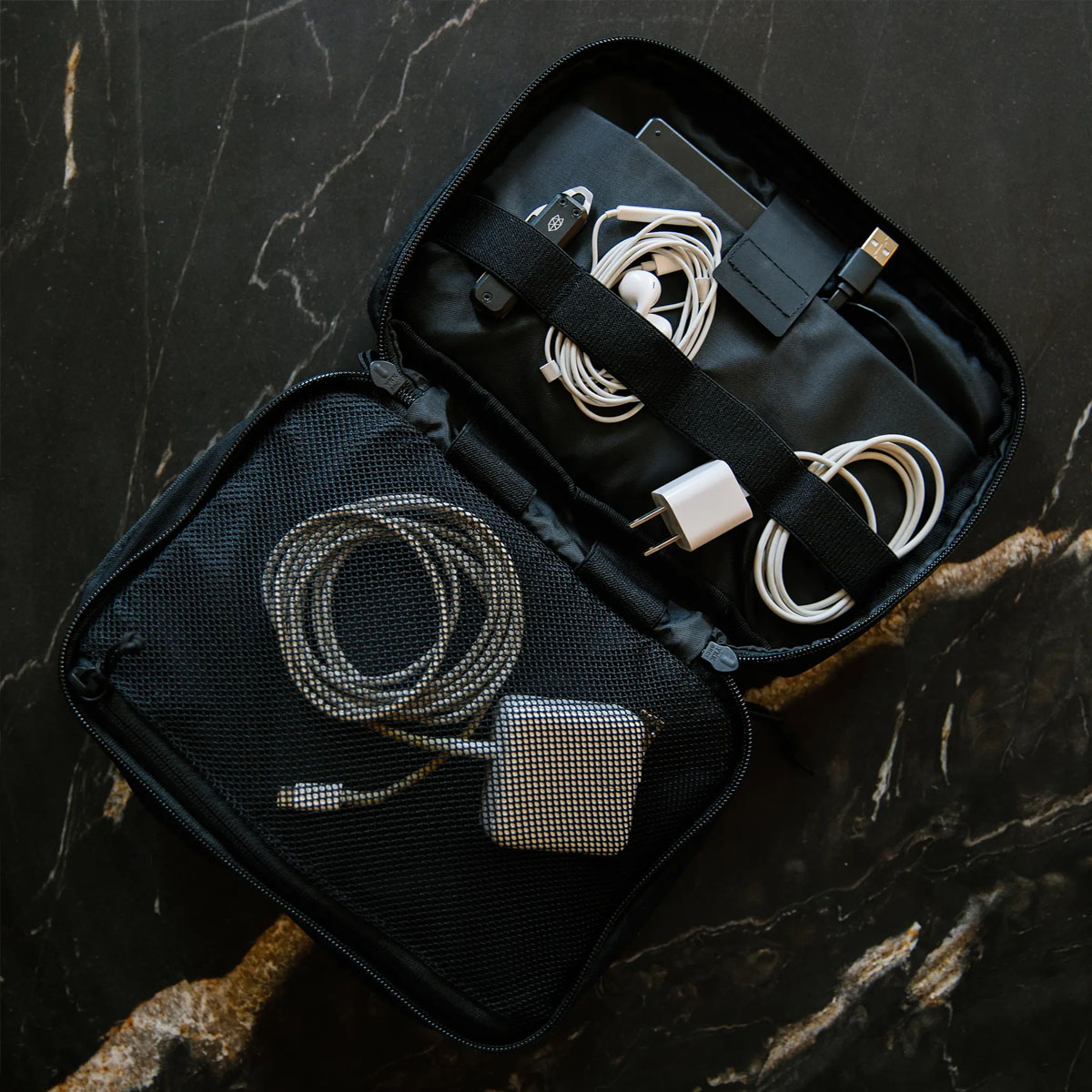 Topo Designs Tech Case Black, perfect for carrying and organizing your essentials