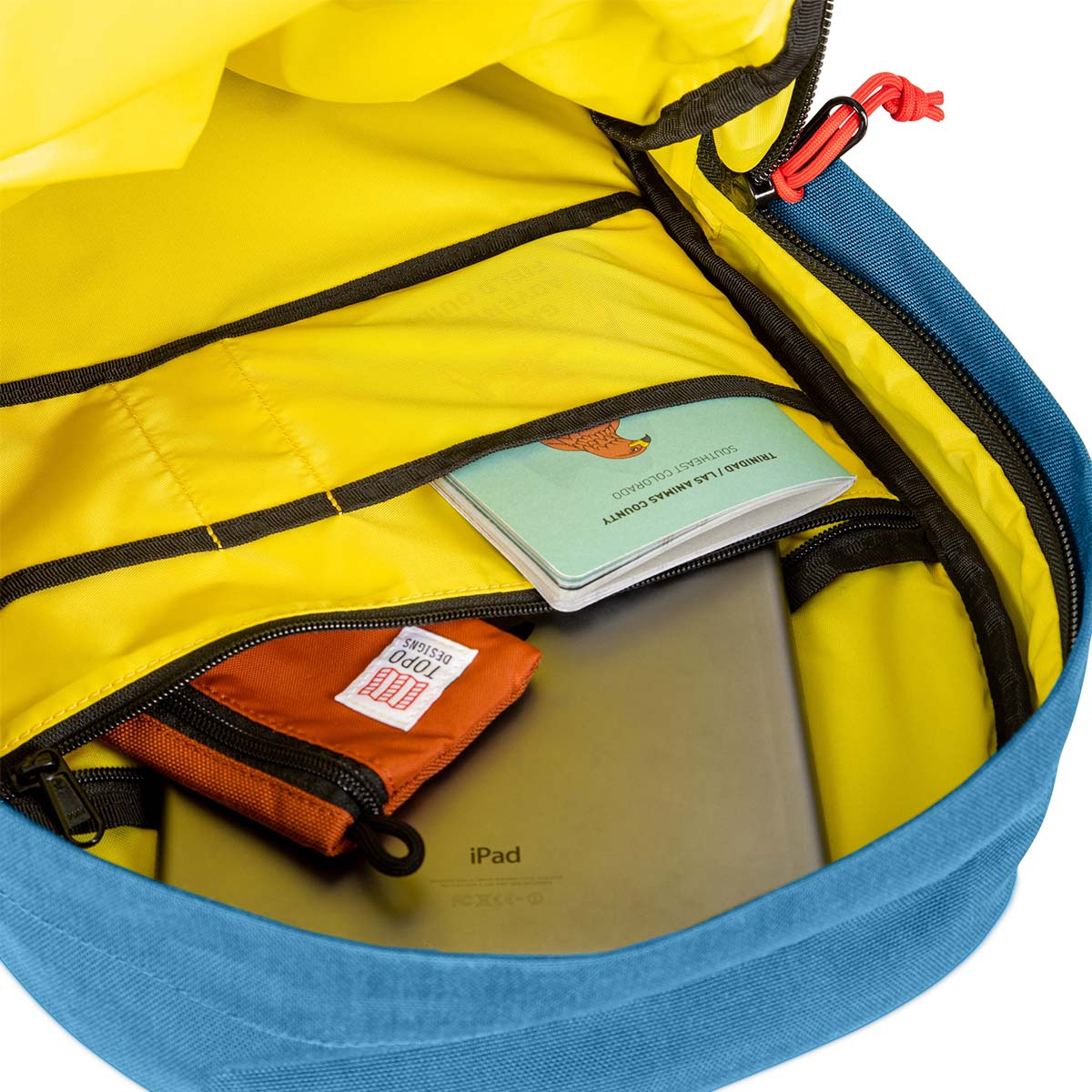 Topo Designs Daypack Classic Blue/Khaki, it’s great as an everyday work bag, yet it has enough room for extra layers on the trail