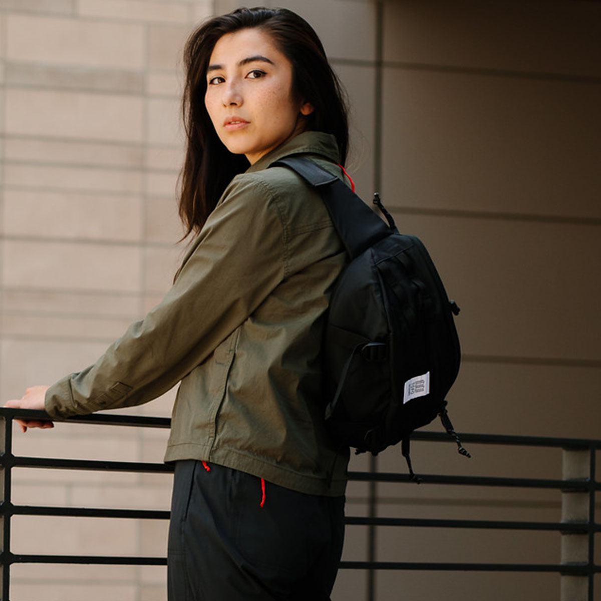 Topo Designs Mountain Sling Bag Black, carrying on your back