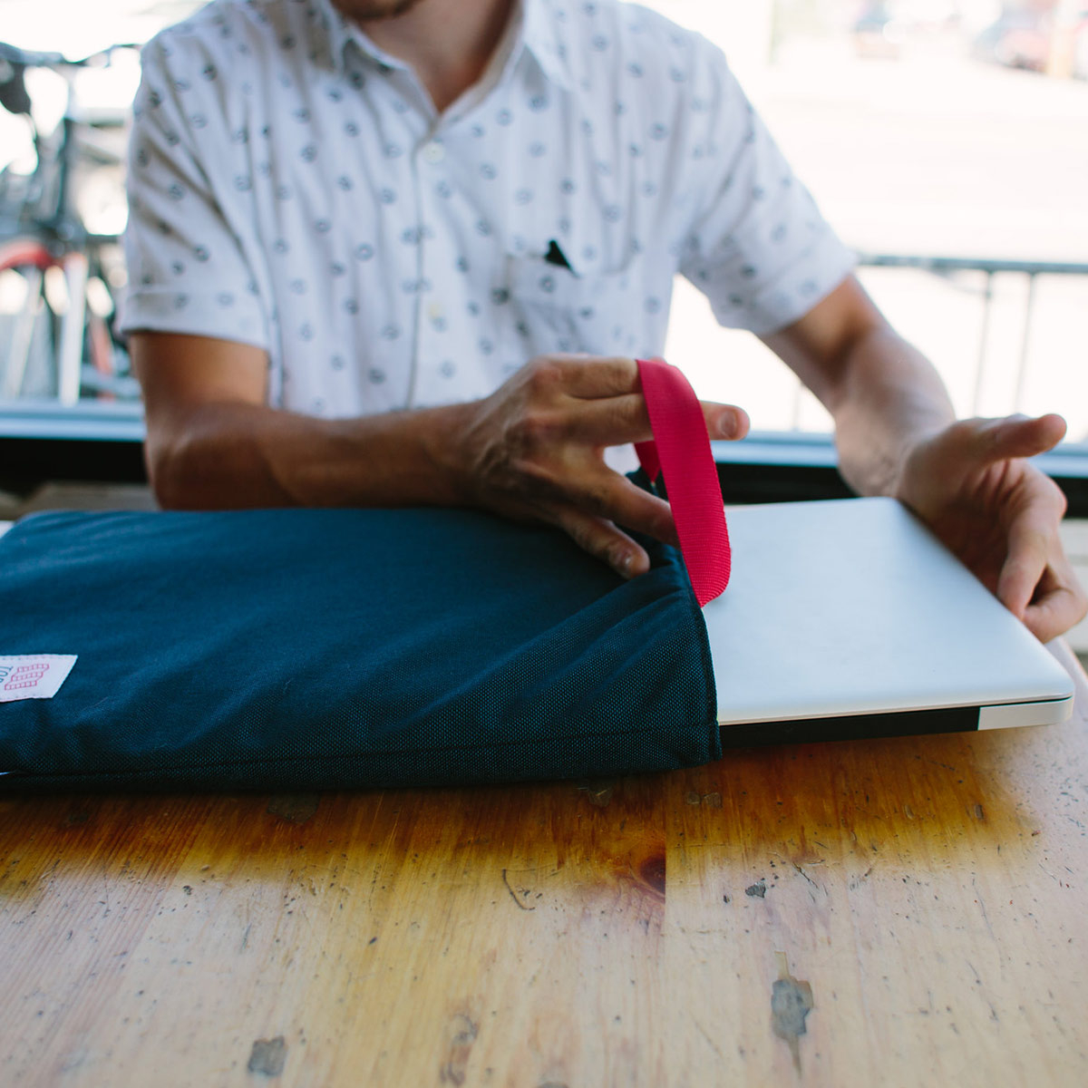 Topo Designs Laptop Sleeve Navy, made with 1000D nylon outer and foam padded body