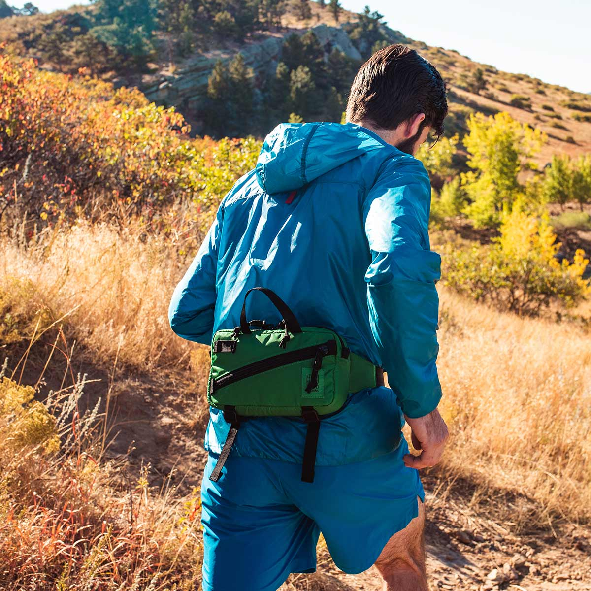 Topo Designs Mini Quick Pack Green, a well-built, secure bag for travel