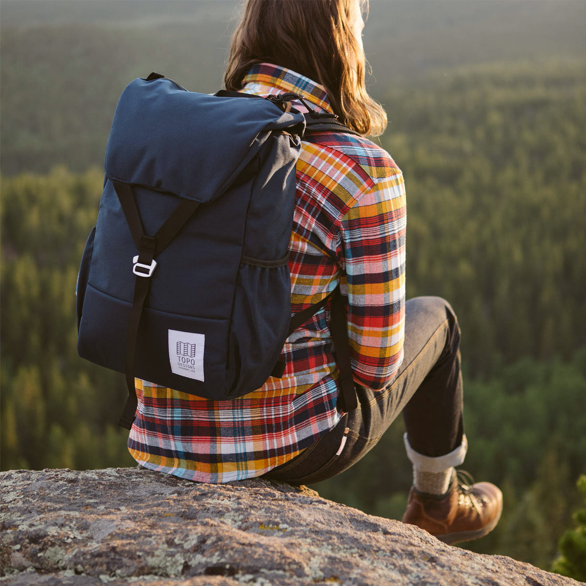 Topo Designs Y-Pack Navy fuses classic style and modern functionality