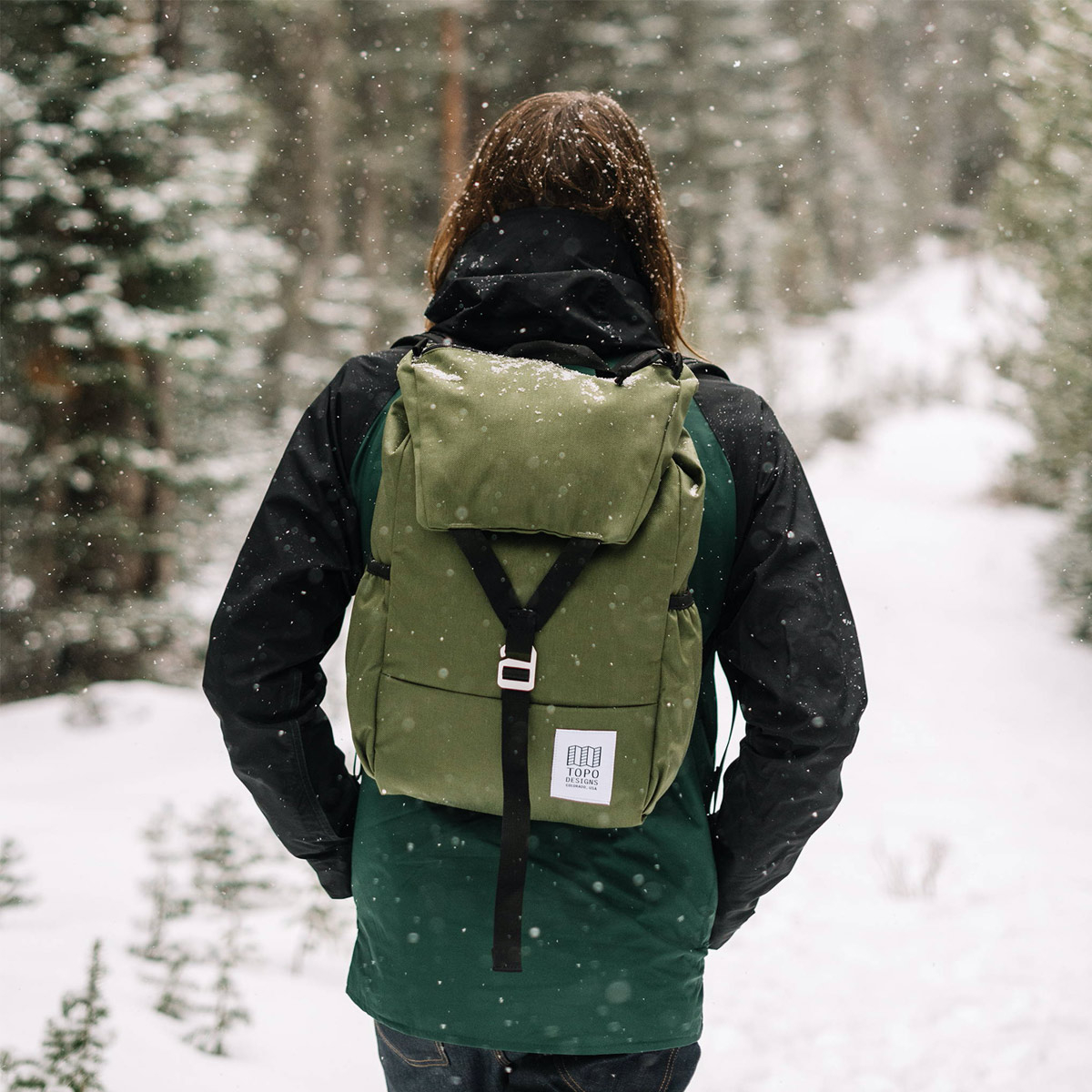 Topo Designs Y-Pack Olive fuses classic style and modern functionality